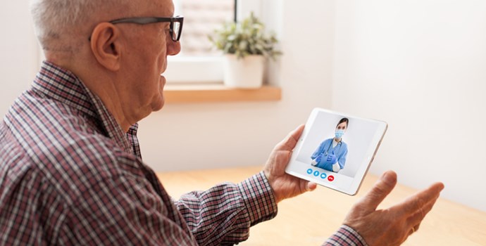 Old Man Using Tablet For Video Call Istock 1308505733 Plyushkin