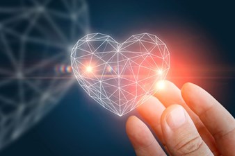 Digital heart in hand