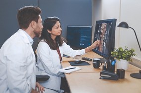 Doctors at imaging screen