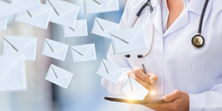 Doctor with email icons